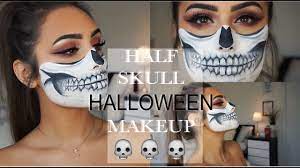 half skull halloween makeup look you