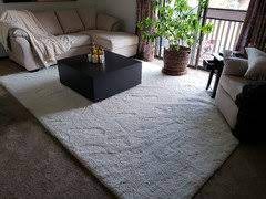 area rug on top of carpeting