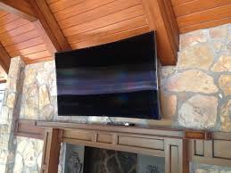 4k Curved Led Tv Over Fireplace