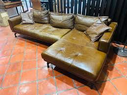leather sofa brown with 2 cushions and