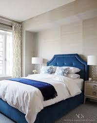 blue velvet tufted bed with gray