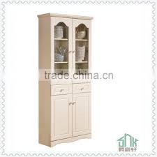 white antique bookcase with glass doors