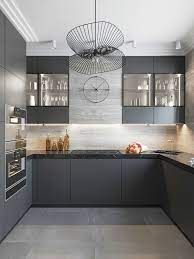 As beige is considered as the timeless color on the earth, grey can be the second color to. Modern Black And Grey Kitchen With Geometric Pendant Light Double Oven And Brass Modern Kitchen Cabinet Design Kitchen Furniture Design Kitchen Room Design