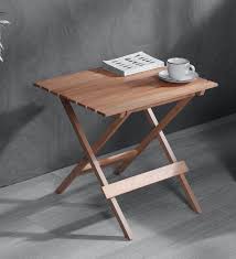 The amazon mefedcy folding desk folds away to fit underneath the bed or in a closet when not in use, can hold a laptop or a this foldable desk is great for working from home — and it's under $100. Buy Foldable Table In Natural Colour By Clasicraft Online Patio Tables Tables Furniture Pepperfry Product