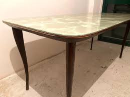 dining table with marbled glass top