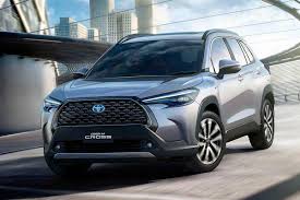 Toyota describes the corolla's interior design philosophy as sensuous minimalism. the layout is clean and horizontal with few lines, and the dash dominated by an infotainment touch screen. 2021 Toyota Corolla Cross Iconic Sedan Nameplate Now An Suv Also The Financial Express