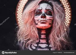 halloween female skull makeup stock