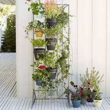 Cement can also be used for a diy plant stand with a copper base to support it. Ssyvrupbhbvz M
