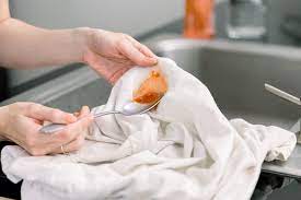remove tomato sauce stains from clothing