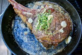 grill a tomahawk in a cast iron pan