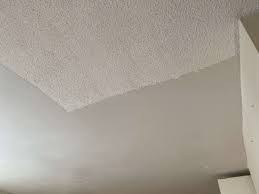 skim coating over popcorn ceilings