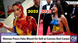 fake blood on self at cannes red carpet