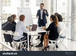 Millennial Businessman In Suit Stand Hold Meeting Make Flip