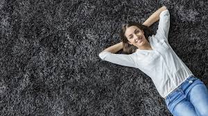 woman laying on frieze carpet carpet