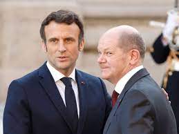 Emmanuel Macron to Meet With Olaf Scholz in Berlin on Monday - Bloomberg