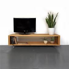 Almost everybody—including you, probably—enjoy the time of the day when they can sit back and relax in front of the tv while watching the favorite programs. Low Solid Wood Large Tv Stand Coffee Table Media Unit On Mid Century Hairpin Legs Large And Medium Tv Stand And Coffee Table Large Tv Stands Tv Stand Designs