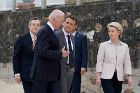 He wrapped his arm around french president emmanuel macron and joked around with canadian prime minister justin. Biden Revels In Trump S Absence From The World Stage Politico