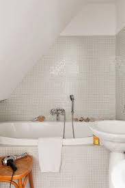 small bathroom with white gl mosaic