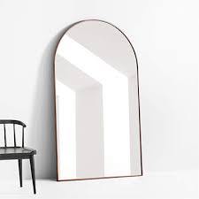 large arched floor mirror