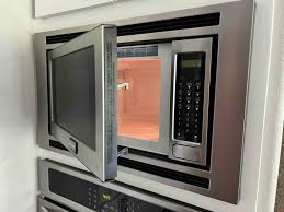 Microwave Turns On When Opening The