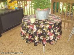 70 round fabric tablecloth nice
