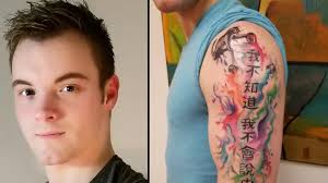 guy gets chinese symbols tattooed on