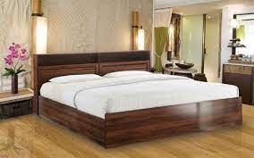 brown queen size wooden bed with