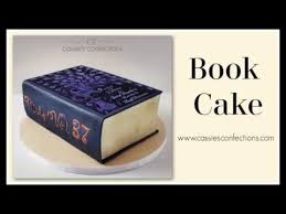 When done and cooled, place the cake on a cake board and carve small pieces away from the middle to create the book crease. Book Cake Youtube