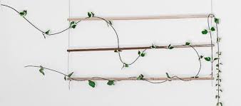 This would be an interesting piece to look at under a garden patio or even against a garden wall in a porch. 8 Easy Diy Indoor Trellis Ideas To Bring The Greenery Inside