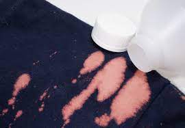 remove bleach stains from clothes