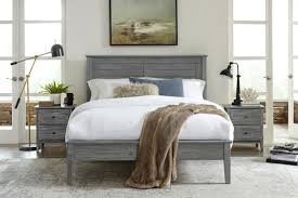 A tall headboard has impact and immediately anchors the space. Greenport Louvered Platform Bed Grain Wood Furniture