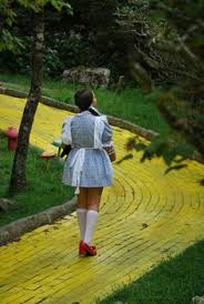 Image result for images dorothy on yellow brick road