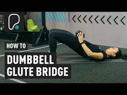 glute bridge with a dumbbell