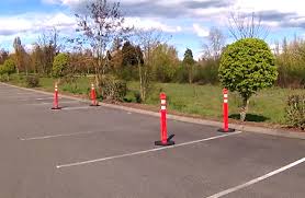 Imagine that the cones represent the front and rear bumpers of the two cars you are trying to park between and align yourself accordingly. Parallel Parking With Four Poles On The Washington State Driving Test