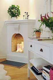 fake white limestone corner fireplace