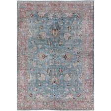 pink antique persian tabriz rug