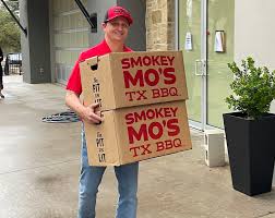 smokey mo s bbq donates warm meals to