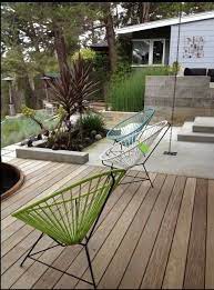 Wood Deck Next To Concrete Patio