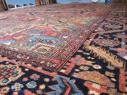 large heriz carpet with pale colours