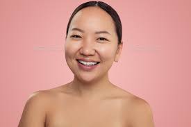 happy young asian woman without makeup