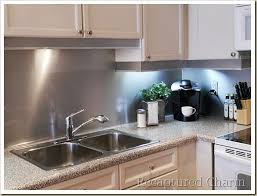Add a vintage charm to your kitchen with this peel and stick. Recaptured Charm Backsplash With The Look Of Stainless Steel Stainless Backsplash Metal Backsplash Kitchen Trendy Kitchen Backsplash