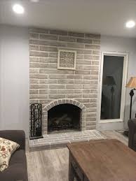 I Whitewashed Our Brick Fireplace With