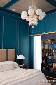 Teal Bedroom With Mirrored Nightstands