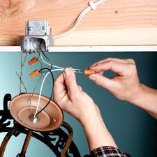 How do you fit a light fixture into a hole? How To Replace A Light Fixture Diy Family Handyman