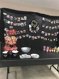 Here's my taco bar checklist! Gold And Black Graduation Decor Photo Wreath And Photo Wall Walking Taco Bar Graduation Decorations Graduation Party Gold Graduation Party