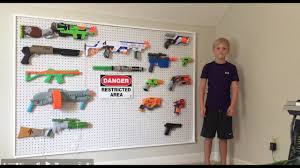 Mount the pegboard to the wall with mounting screws or choose a shoe organizer with pockets approximately the same width as your nerf guns to make sure they. Nerf Gun Storage On Pegboard Diy Youtube