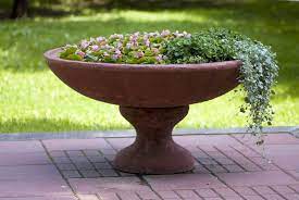 gardening in urn planters and garden
