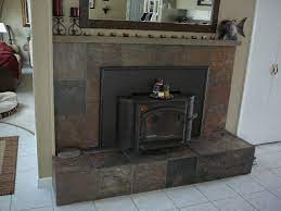 Slate Tiled Over Red Brick Fireplace