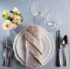 Loosely grab the center and tie in a knot. 12 Ways To Fold A Napkin Best Napkin Folding Ideas