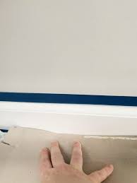 how to paint baseboards on carpet